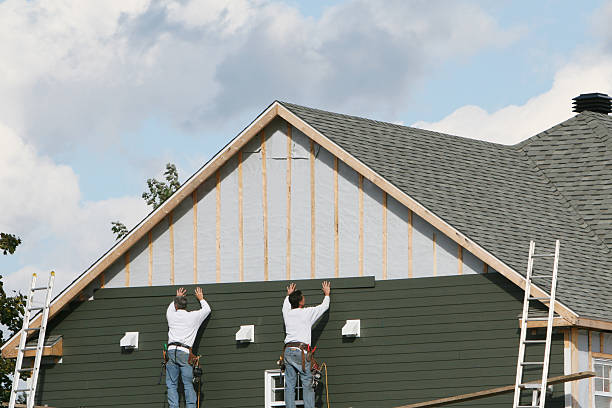 Professional Siding technician working in Hebron, IN